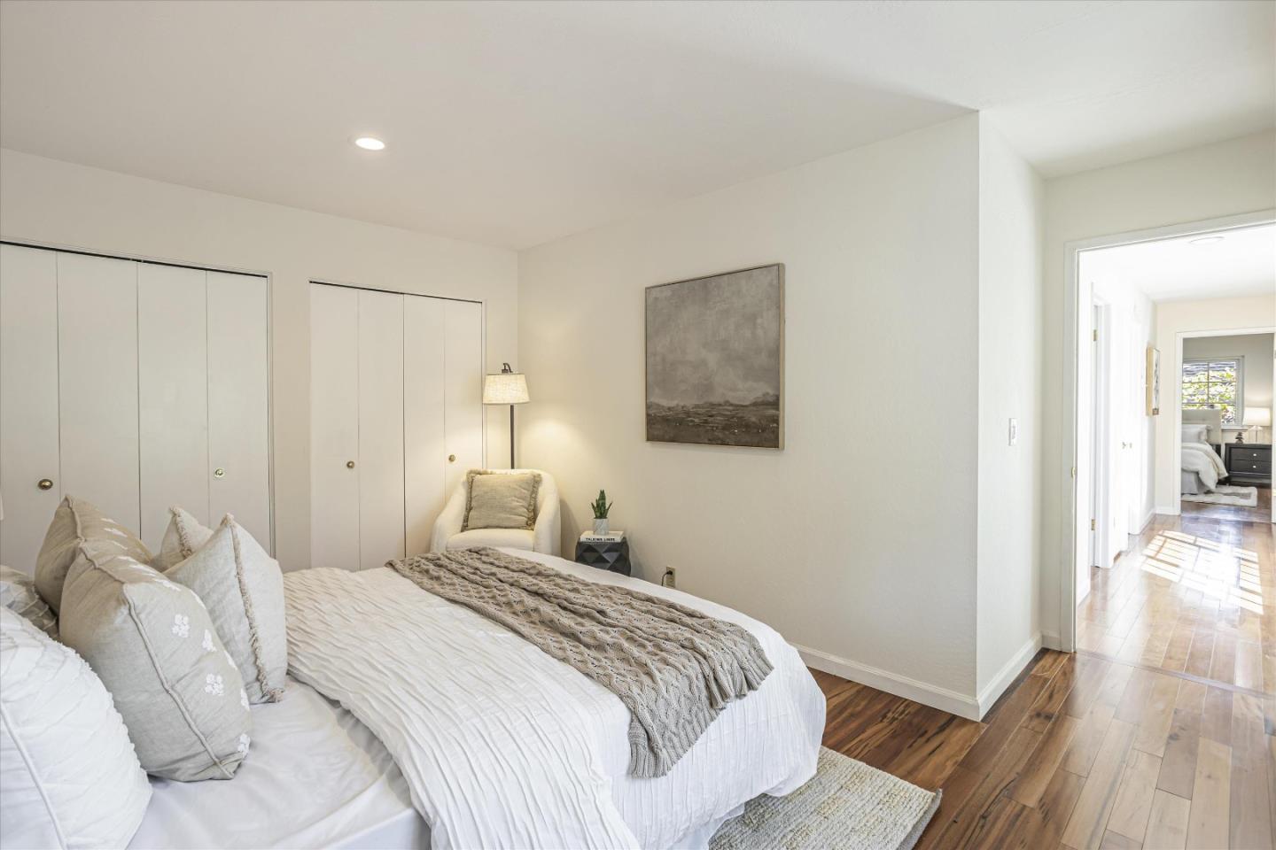 6367 Prospect Road San Jose, CA 95129 - Photo 25 of 33 a bedroom with a bed and a painting on the wall