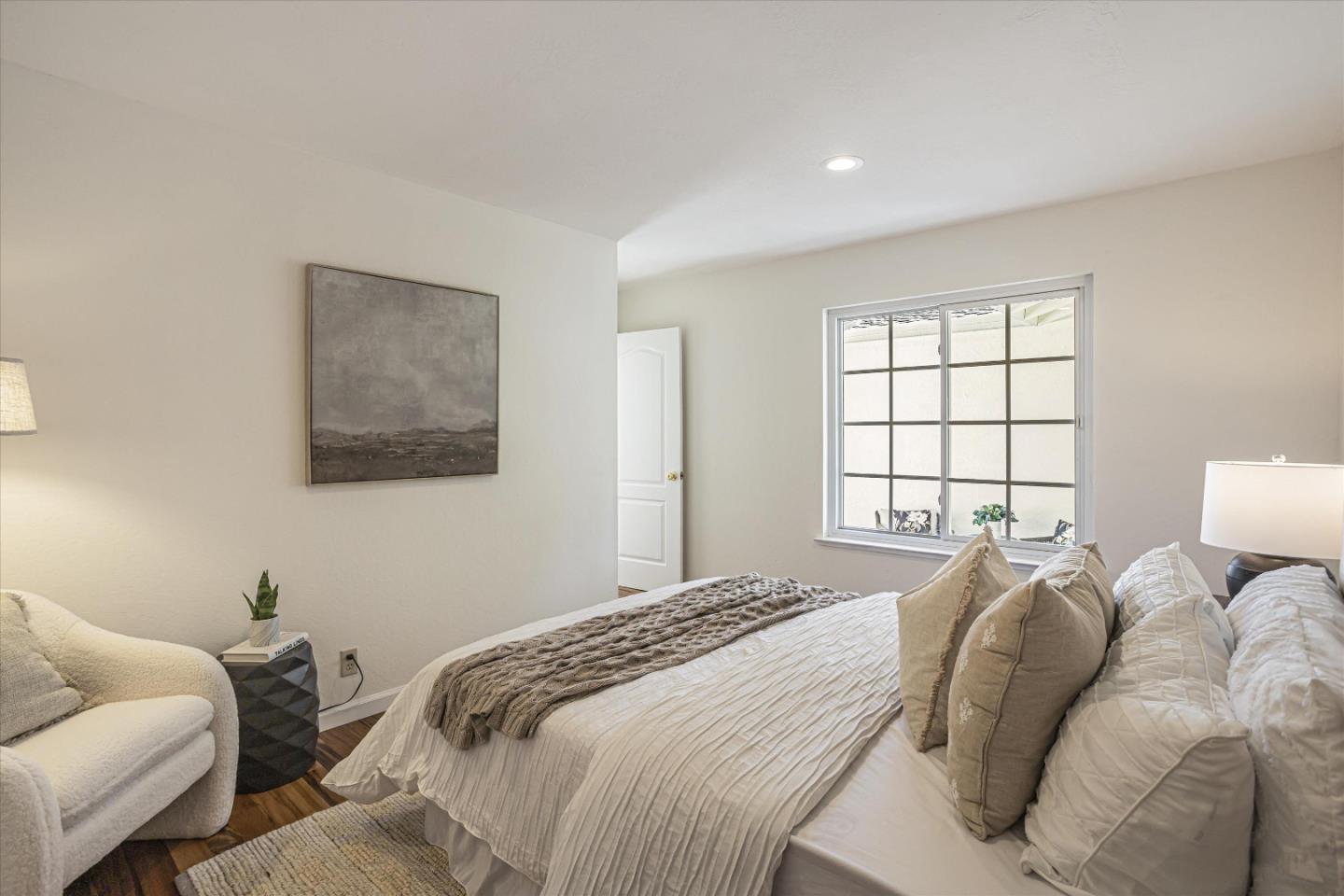 6367 Prospect Road San Jose, CA 95129 - Photo 26 of 33 a bedroom with a bed and a window
