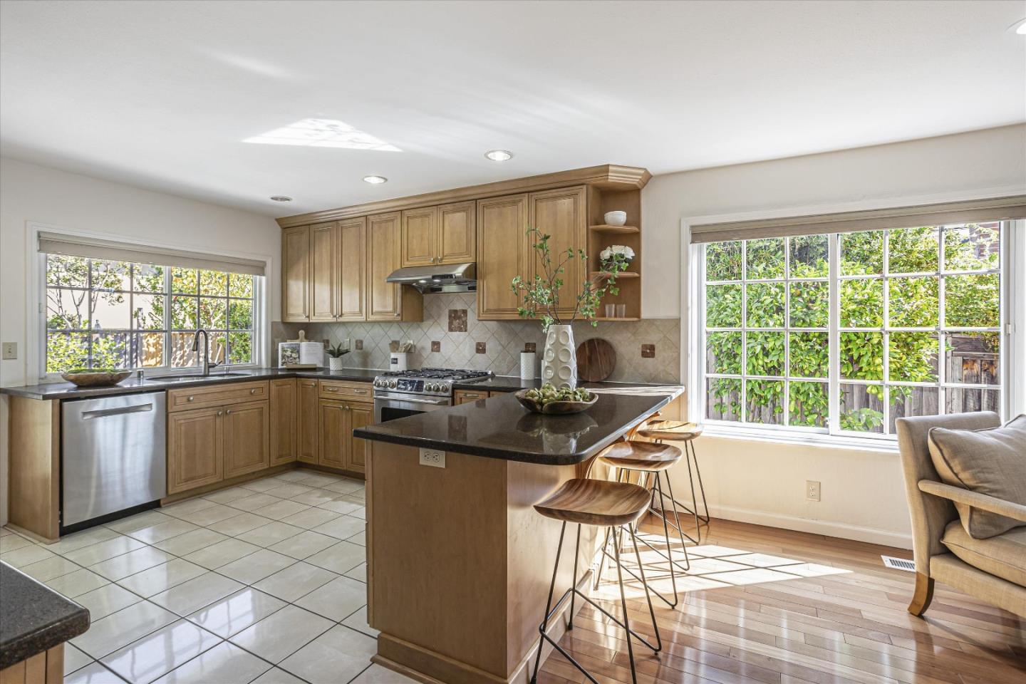 6367 Prospect Road San Jose, CA 95129 - Photo 9 of 33 a kitchen with a sink a counter top space and stainless steel appliances