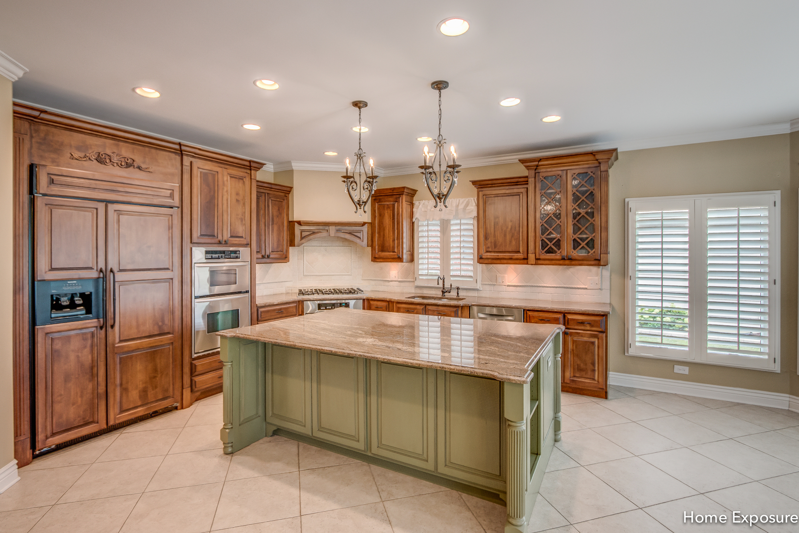 2433 Legacy Drive Aurora, IL 60502 - Photo 17 of 66 a kitchen with kitchen island granite countertop a sink a counter top space appliances and cabinets