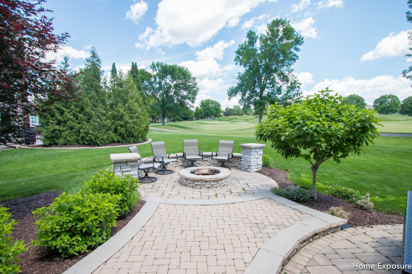 2433 Legacy Drive Aurora, IL 60502 - Photo 53 of 66 a view of a patio with couches plants and garden