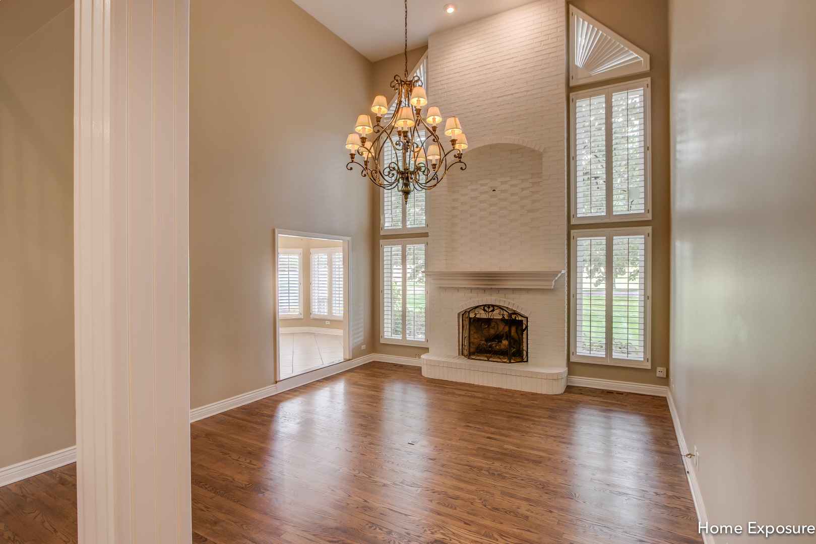 2433 Legacy Drive Aurora, IL 60502 - Photo 10 of 66 a view of a livingroom with window wooden floor and a fireplace