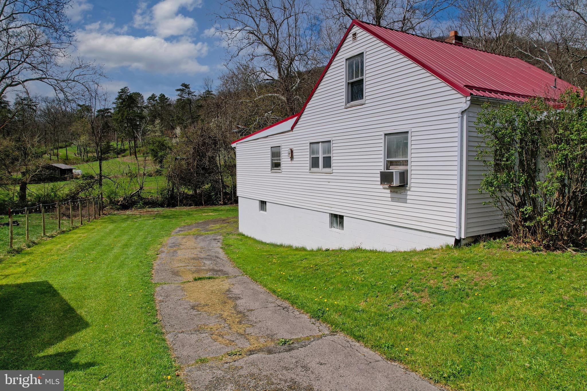 159 Rocket Center Road Keyser, WV 26726 - Photo 58 of 64 a view of a house with a yard
