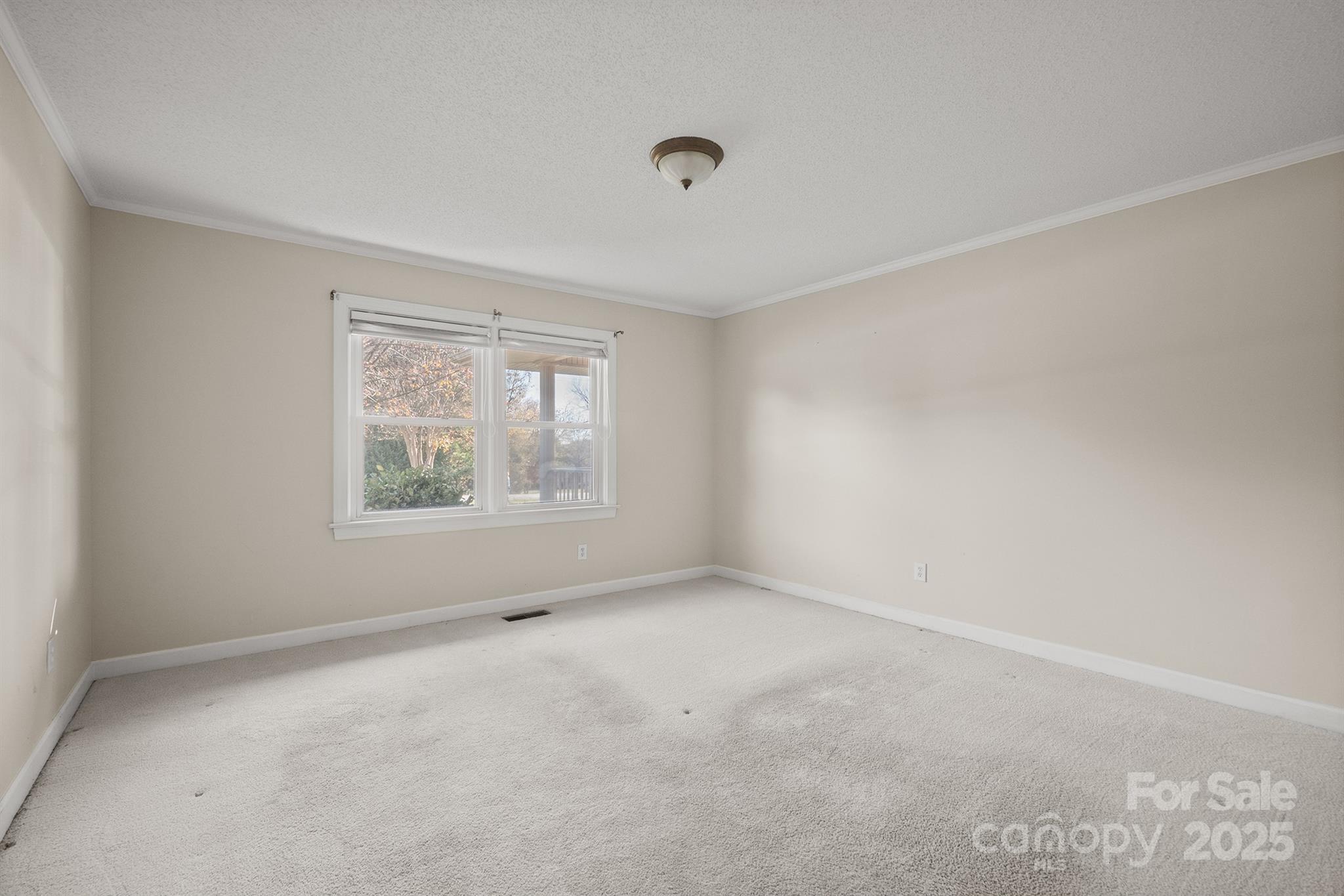 484 Stutts Road Mooresville, NC 28117 - Photo 15 of 28 an empty room with windows