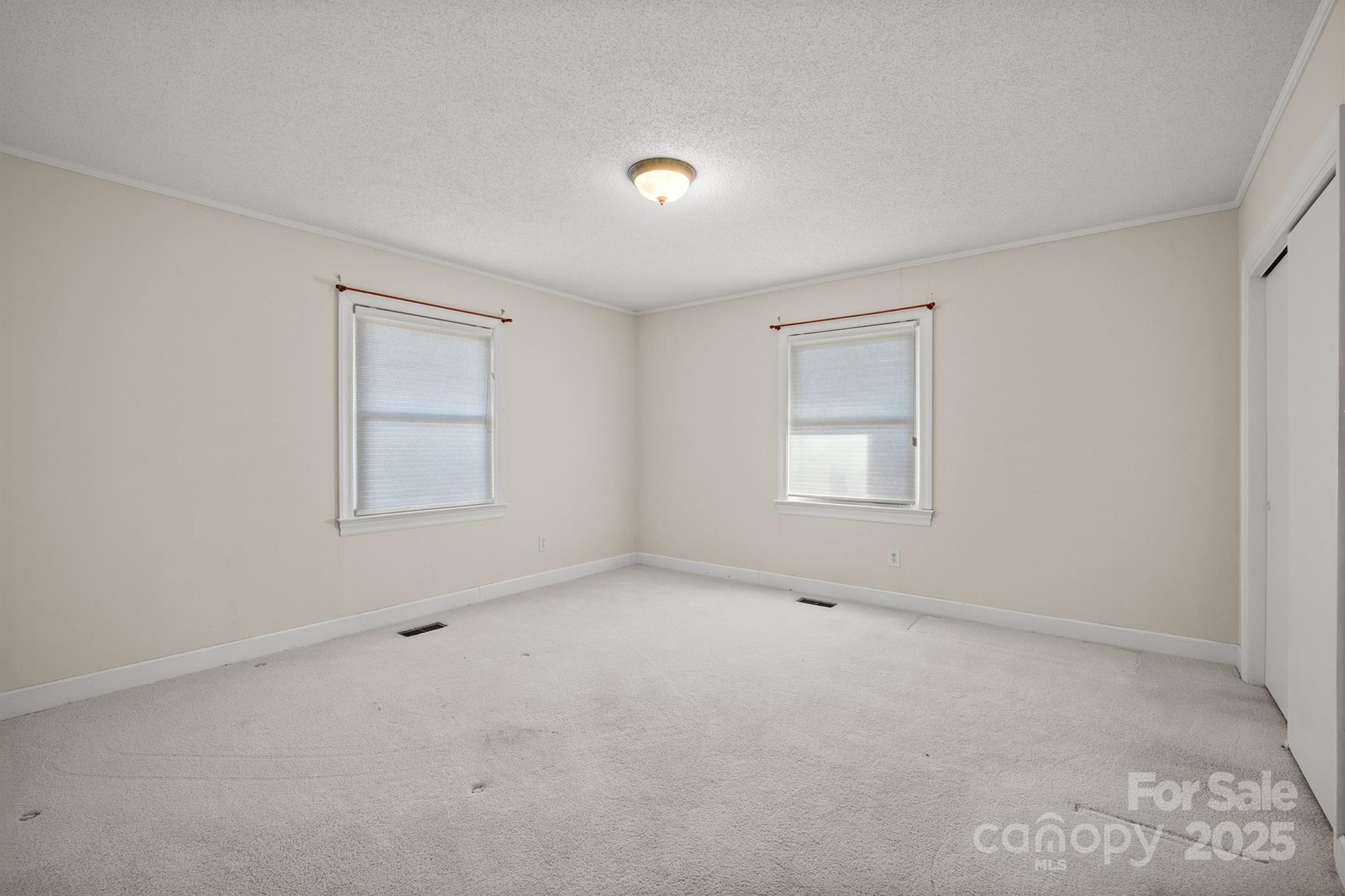 484 Stutts Road Mooresville, NC 28117 - Photo 17 of 28 an empty room with a window