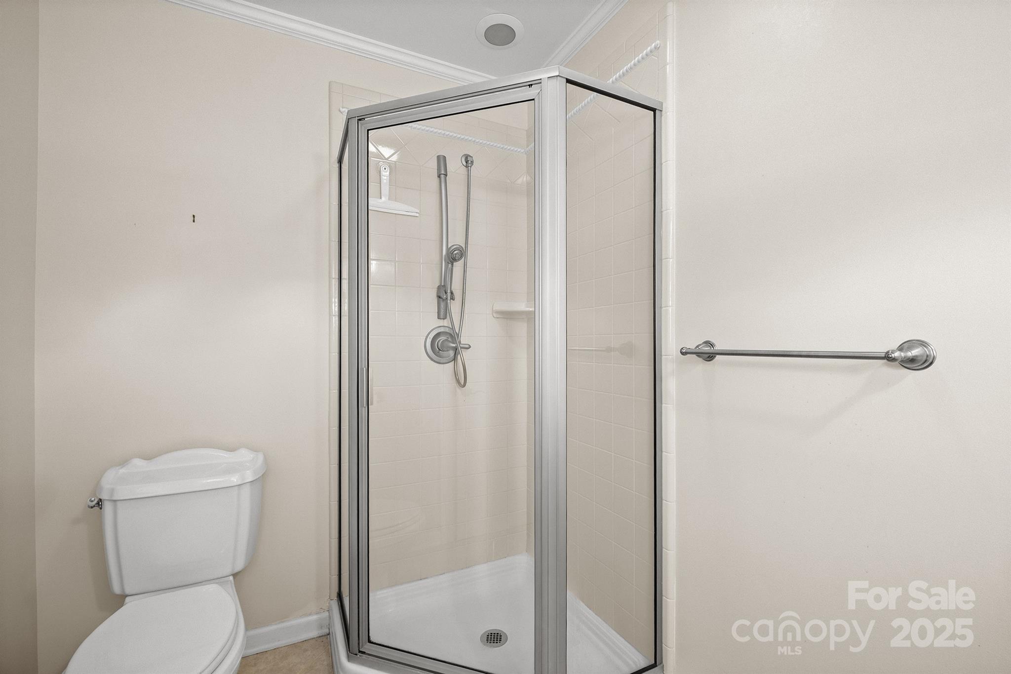 484 Stutts Road Mooresville, NC 28117 - Photo 22 of 28 a bathroom with a toilet and a shower