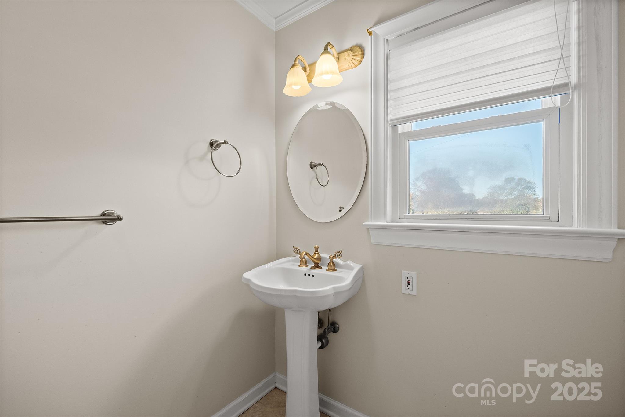 484 Stutts Road Mooresville, NC 28117 - Photo 23 of 28 a bathroom with a sink and a mirror