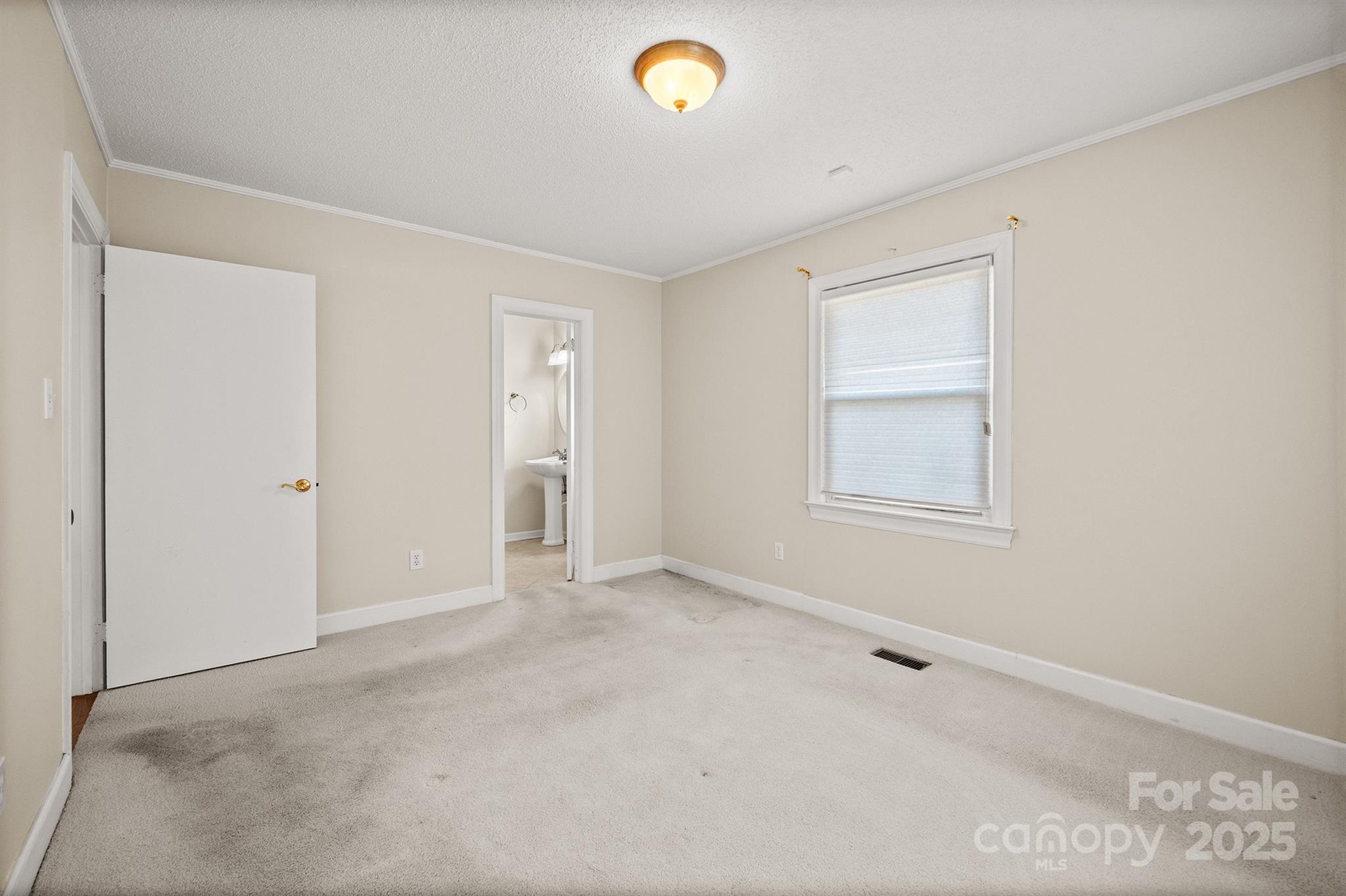 484 Stutts Road Mooresville, NC 28117 - Photo 26 of 28 a view of an empty room with a window