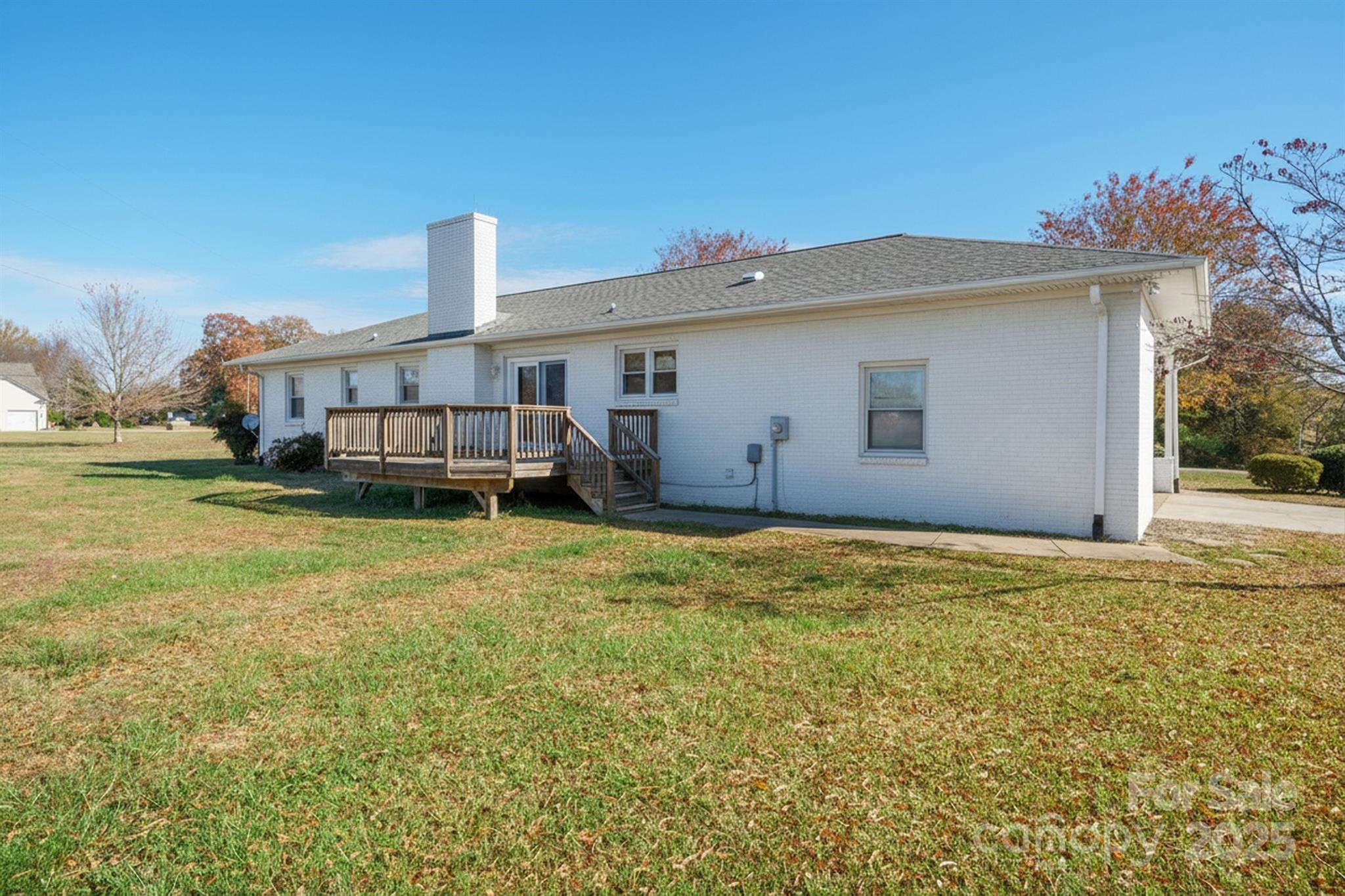 484 Stutts Road Mooresville, NC 28117 - Photo 27 of 28 a view of a house with a yard and sitting area