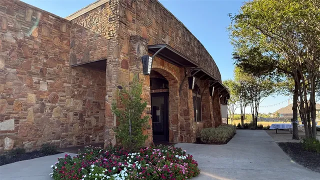 a view of a house with a garden