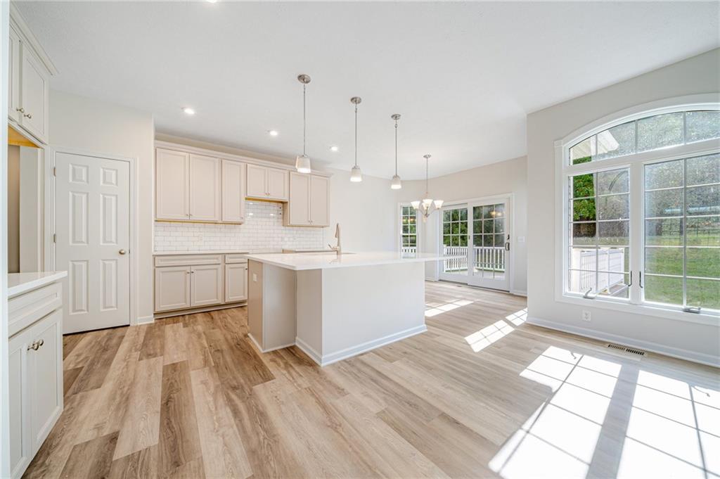 116 Brush Run Road Greensburg, PA 15601 - Photo 12 of 20 a large white kitchen with a large window