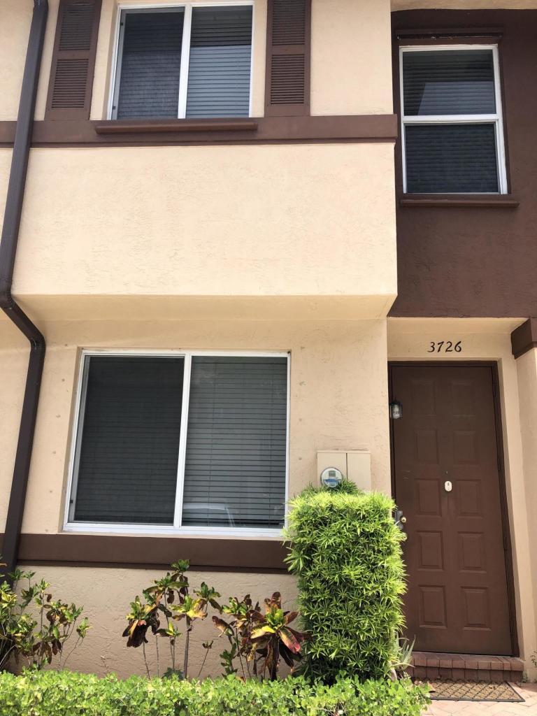 3726 Oleander Terrace Riviera Beach, FL 33404 - Photo 3 of 16 3726Oleander_FrontDoor