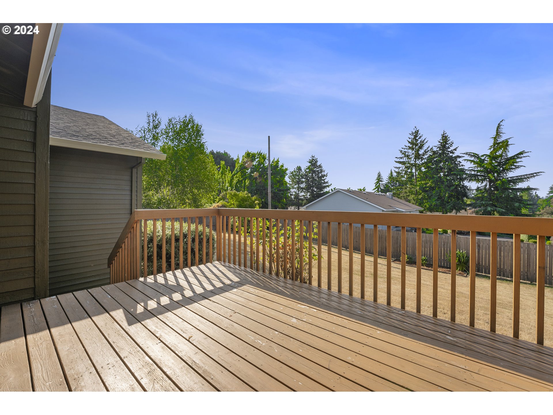 8860 Southwest Maverick Terrace Beaverton, OR 97008 - Photo 19 of 20 a view of deck with wooden floor and outdoor seating