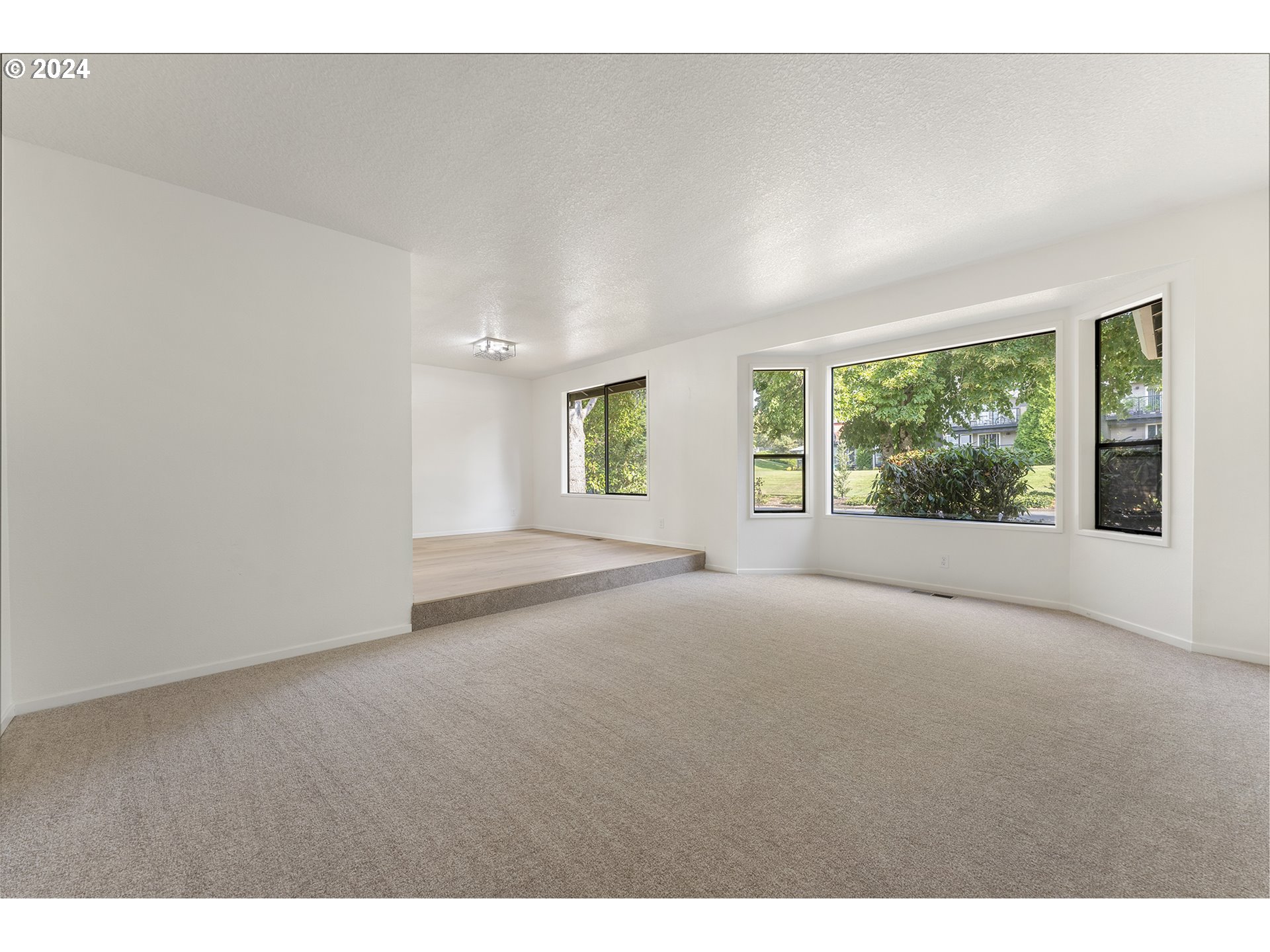 8860 Southwest Maverick Terrace Beaverton, OR 97008 - Photo 10 of 20 a view of a room with a large window