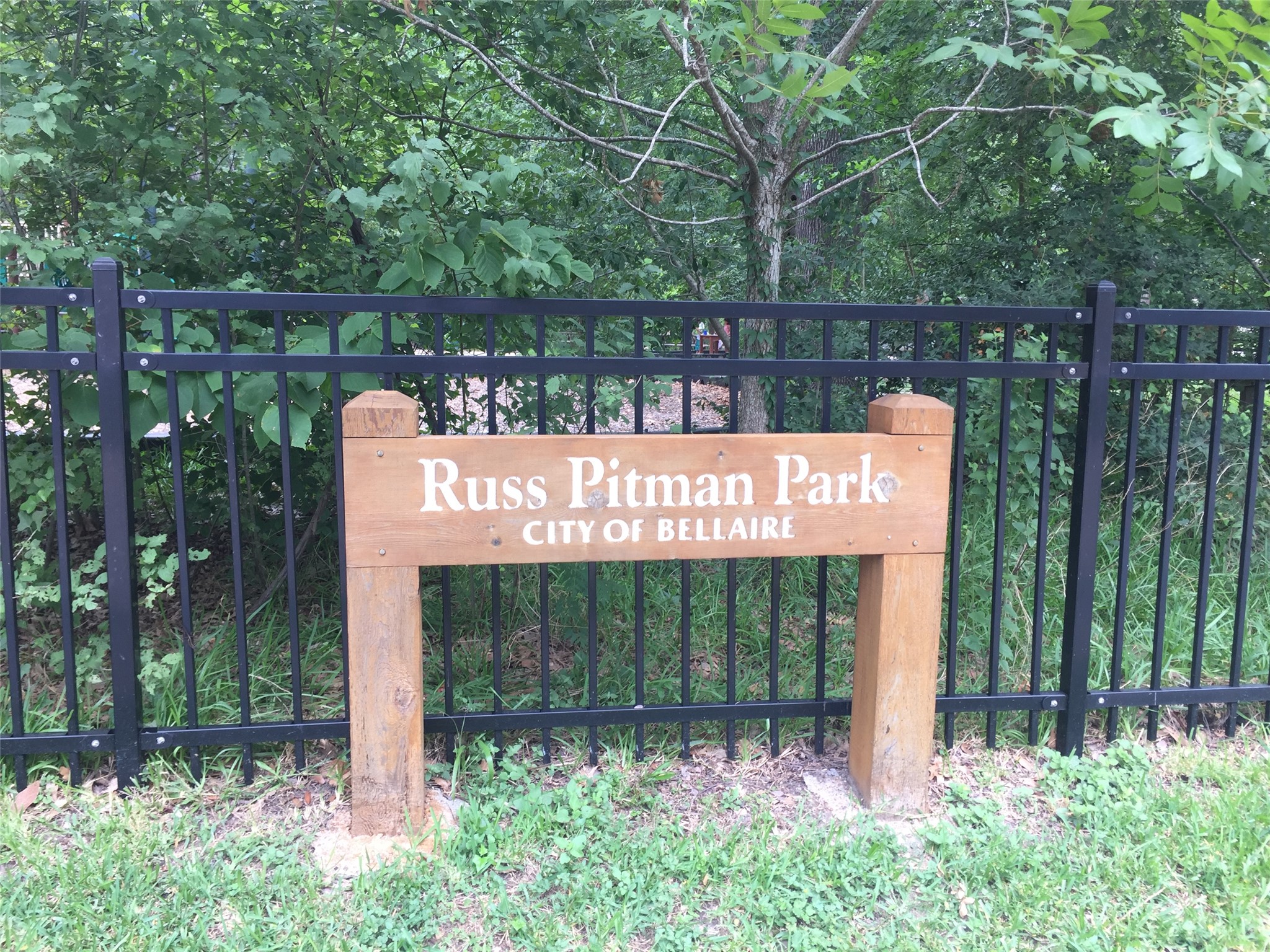 4305 Lafayette Street Bellaire, TX 77401 - Photo 5 of 13 a sign on the side of the house