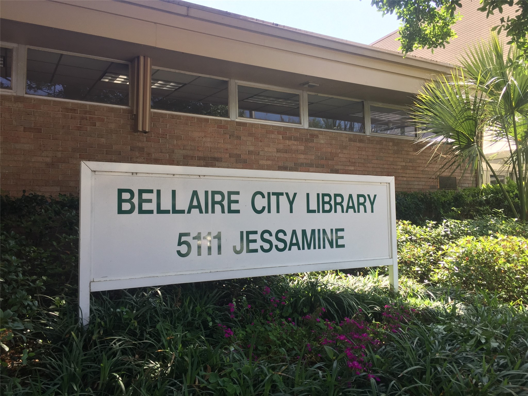 4305 Lafayette Street Bellaire, TX 77401 - Photo 9 of 13 a sign on the side of a building