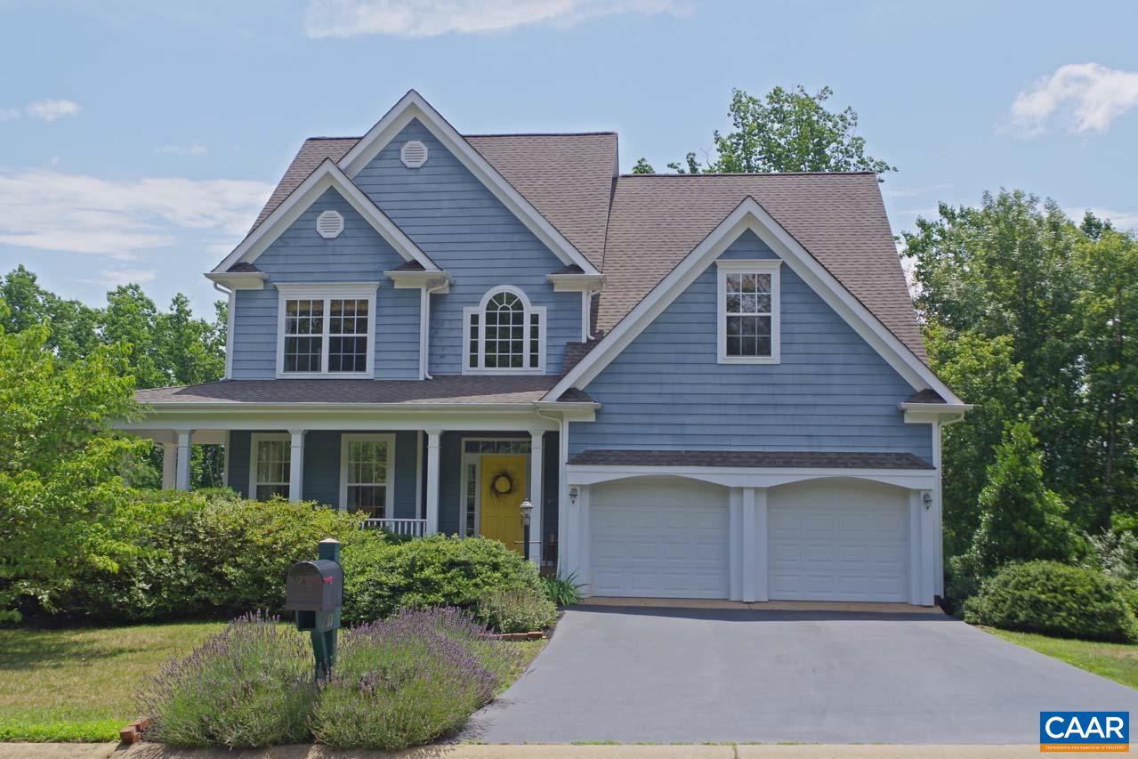 2059 Ridgetop Drive Charlottesville, VA 22903 - Photo 1 of 68 a front view of a house with a yard and potted plants