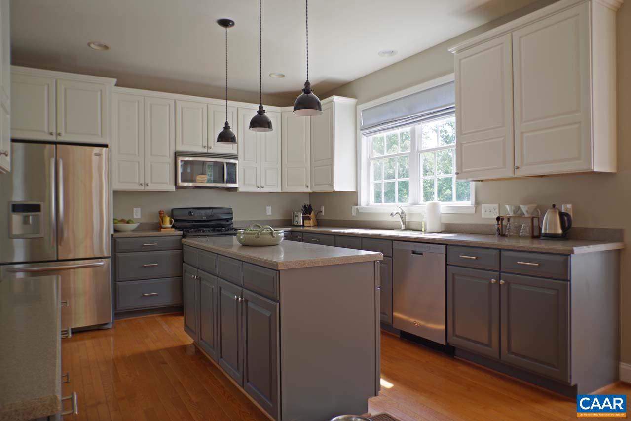 2059 Ridgetop Drive Charlottesville, VA 22903 - Photo 15 of 68 a kitchen with kitchen island granite countertop a sink stainless steel appliances and window