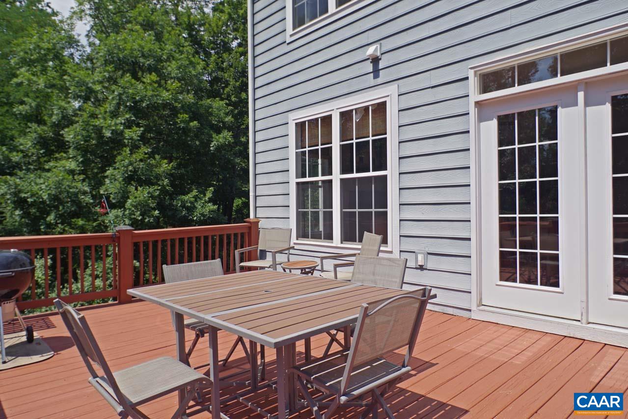 2059 Ridgetop Drive Charlottesville, VA 22903 - Photo 25 of 68 a balcony with table and chairs
