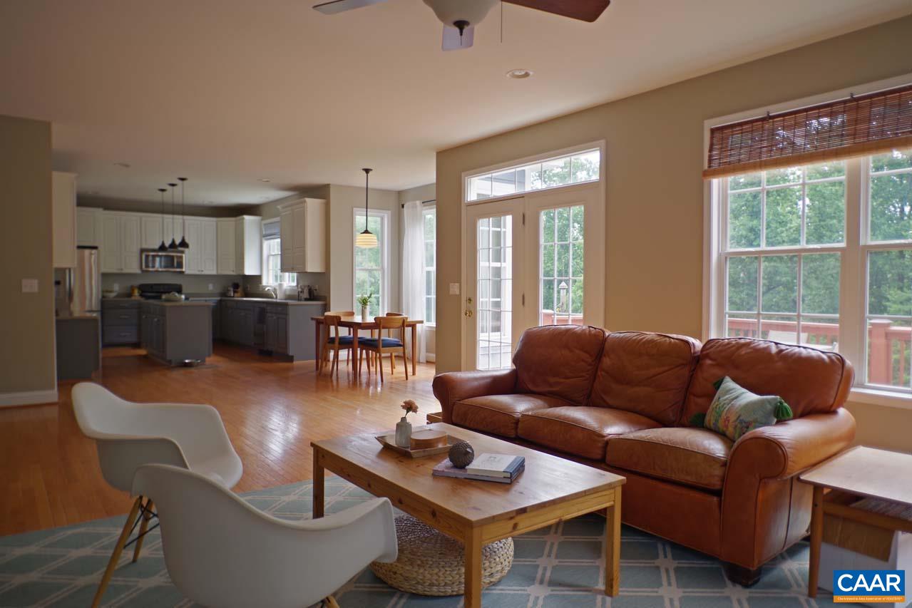 2059 Ridgetop Drive Charlottesville, VA 22903 - Photo 27 of 68 a living room with furniture and a large window