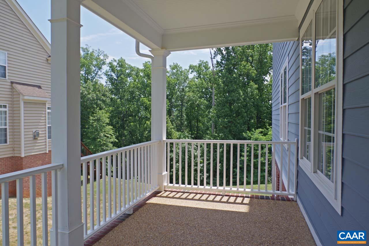 2059 Ridgetop Drive Charlottesville, VA 22903 - Photo 3 of 68 a view of a balcony with floor to ceiling window and wooden floor