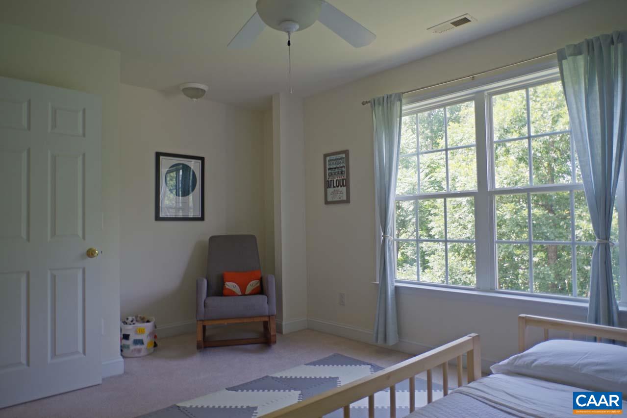 2059 Ridgetop Drive Charlottesville, VA 22903 - Photo 46 of 68 a living room with furniture and a window