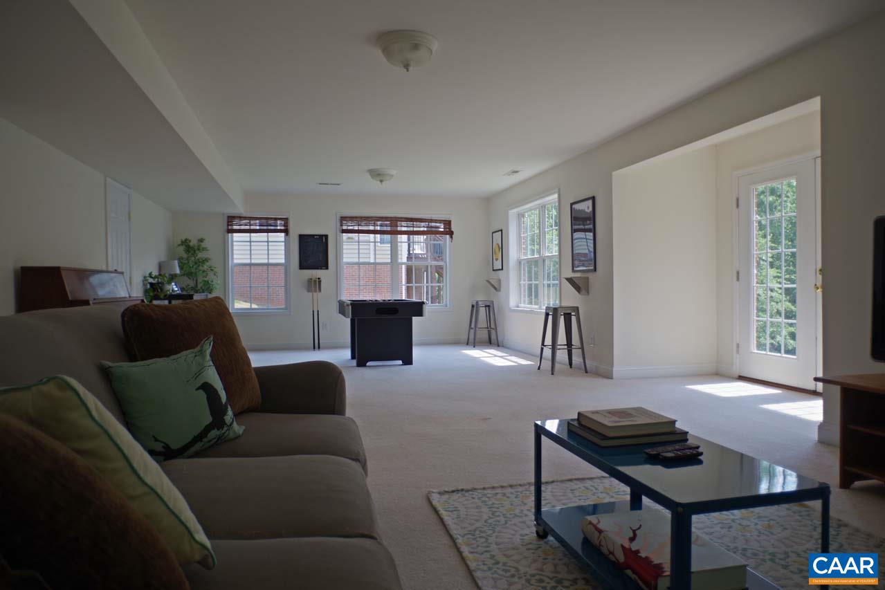 2059 Ridgetop Drive Charlottesville, VA 22903 - Photo 53 of 68 a living room with furniture and a window