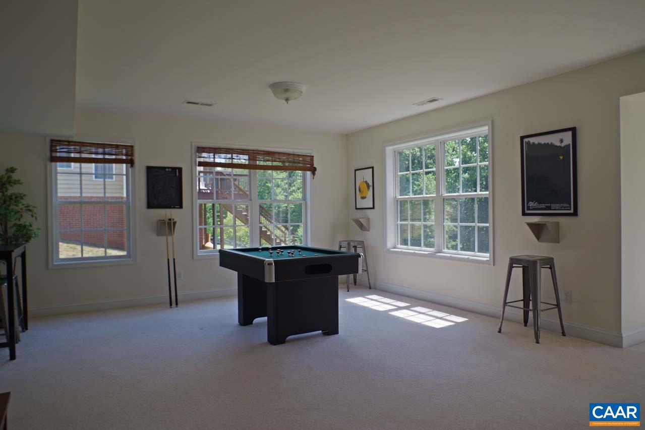 2059 Ridgetop Drive Charlottesville, VA 22903 - Photo 54 of 68 a living room with furniture and a window