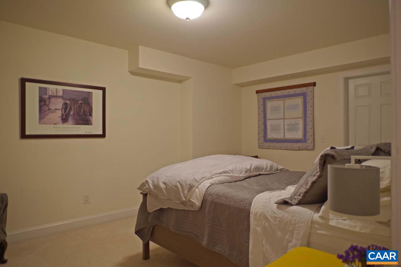 2059 Ridgetop Drive Charlottesville, VA 22903 - Photo 59 of 68 a bedroom with bed and a window