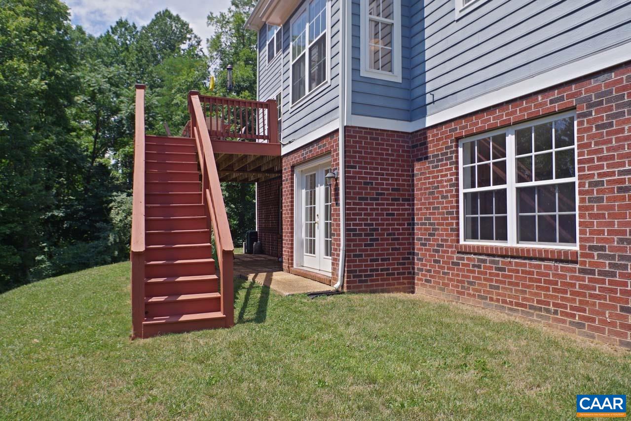 2059 Ridgetop Drive Charlottesville, VA 22903 - Photo 64 of 68 a front view of a house with a garden