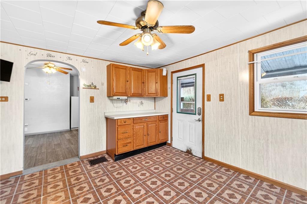101 7th Street Monongahela, PA 15063 - Photo 17 of 43 a room with window and chandelier