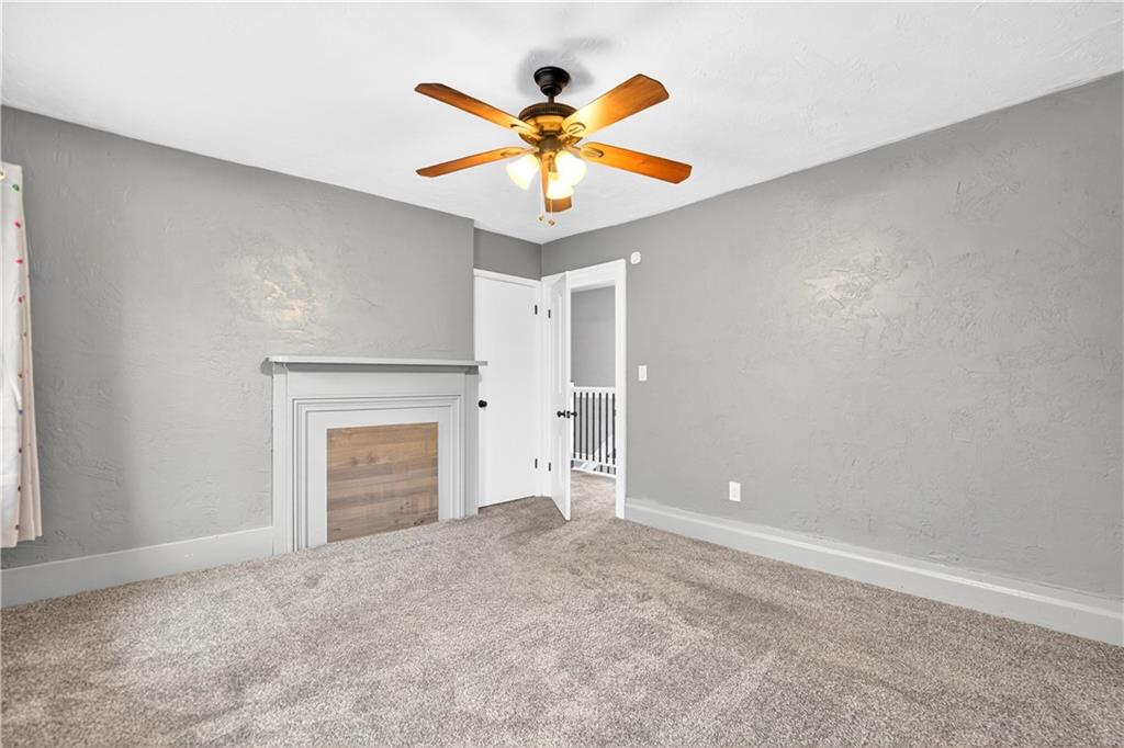 101 7th Street Monongahela, PA 15063 - Photo 19 of 43 an empty room with closet and a ceiling fan
