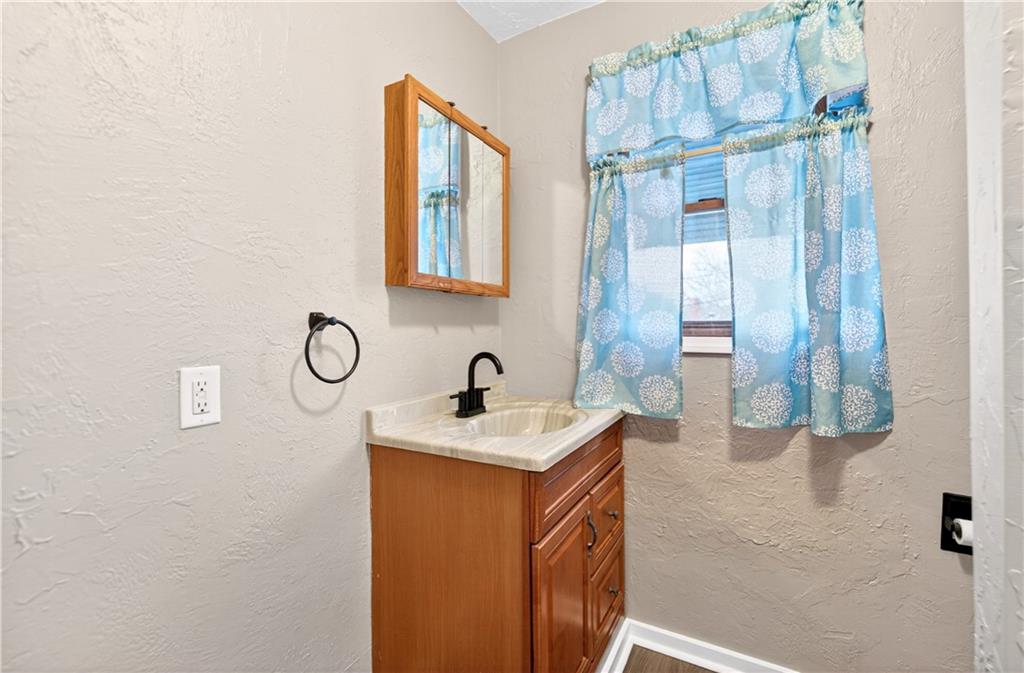 101 7th Street Monongahela, PA 15063 - Photo 24 of 43 a bathroom with a sink and a mirror