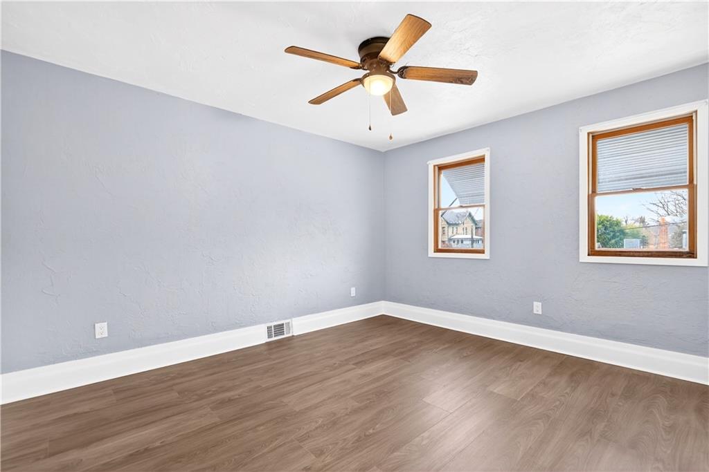 101 7th Street Monongahela, PA 15063 - Photo 26 of 43 a view of a big room with wooden floor and windows
