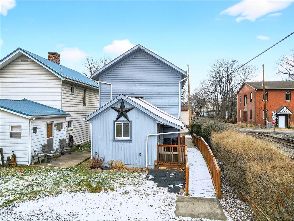 101 7th Street Monongahela, PA 15063 - Photo 29 of 43 a view of a small house with a yard