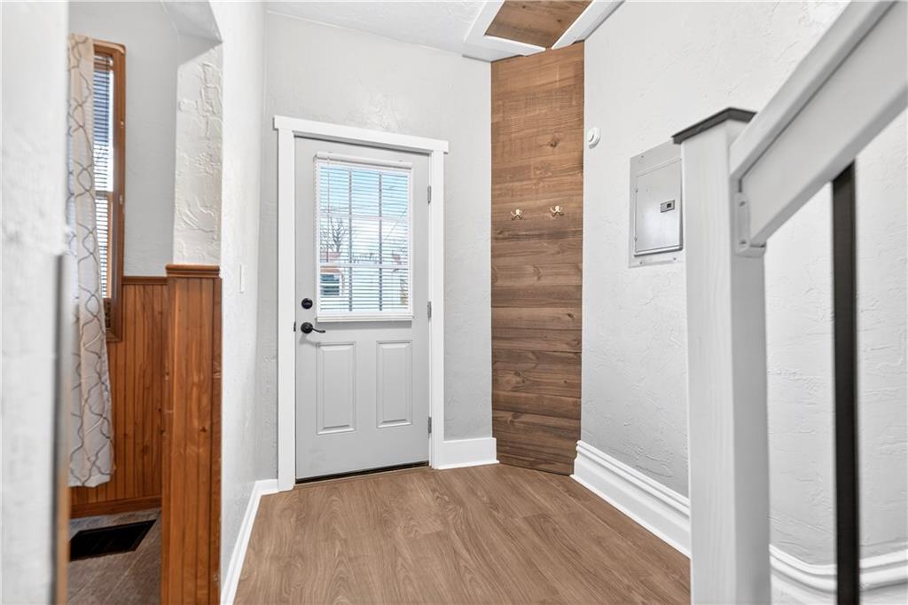 101 7th Street Monongahela, PA 15063 - Photo 4 of 43 a view of a hallway with wooden floor and entryway