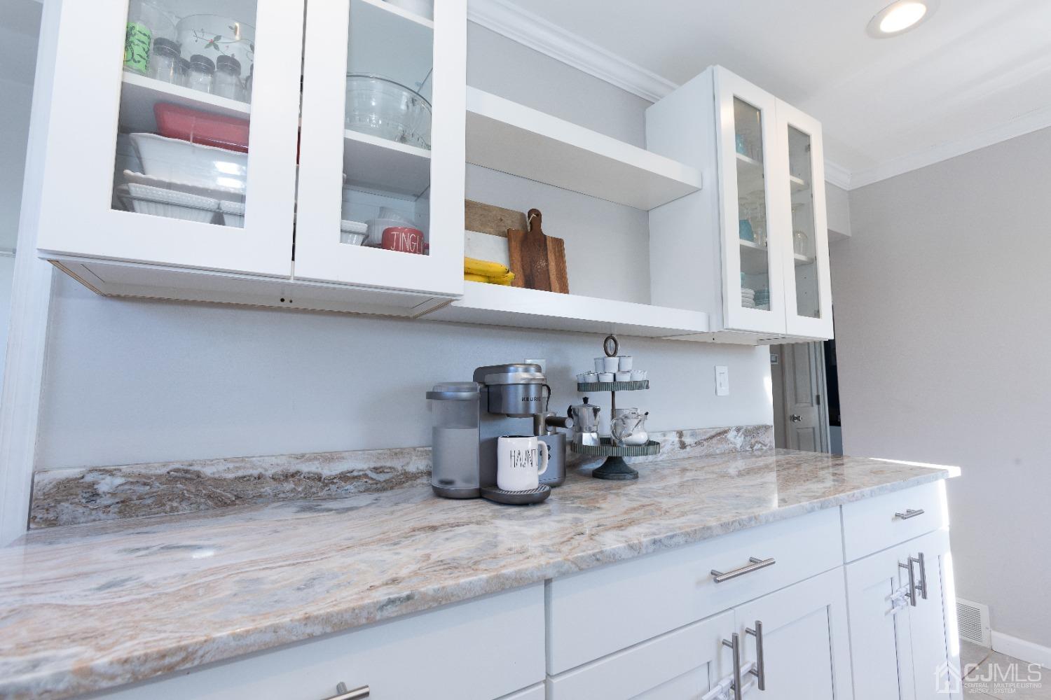 125 Tunison Road New Brunswick, NJ 08901 - Photo 16 of 24 a kitchen with cabinets and window