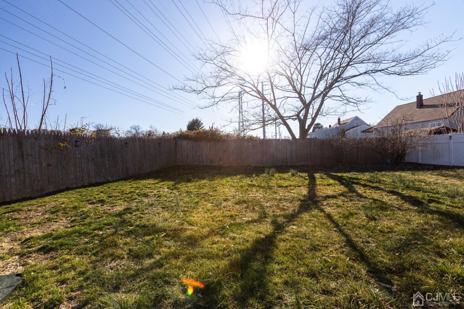125 Tunison Road New Brunswick, NJ 08901 - Photo 24 of 24 a view of backyard with wooden fence