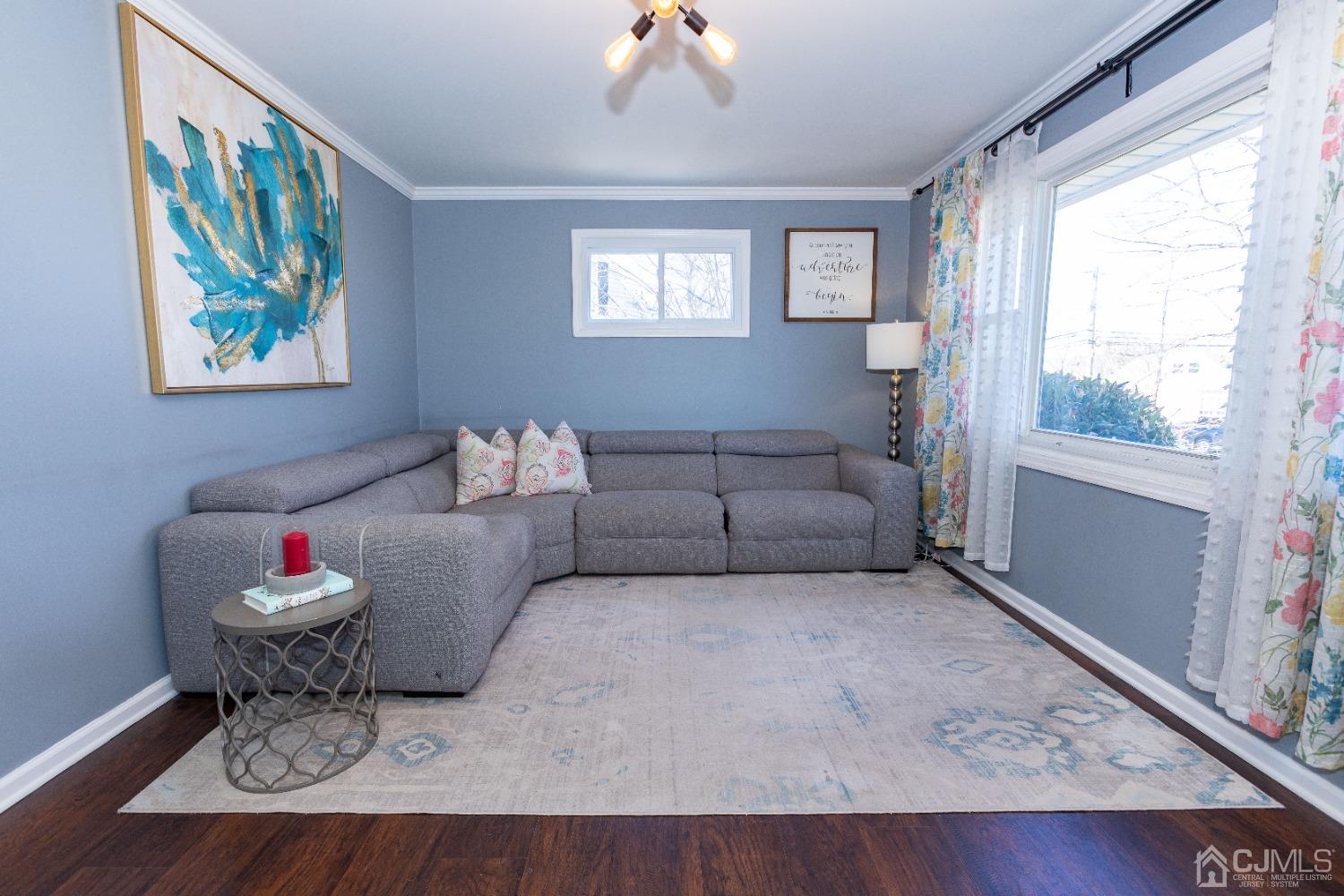 125 Tunison Road New Brunswick, NJ 08901 - Photo 3 of 24 a living room with furniture and a window