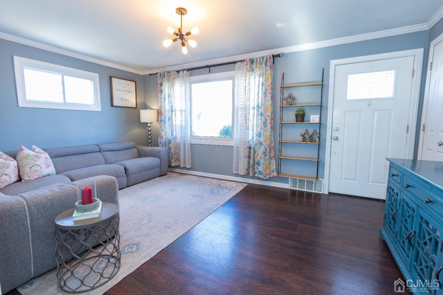 125 Tunison Road New Brunswick, NJ 08901 - Photo 4 of 24 a living room with furniture and wooden floor