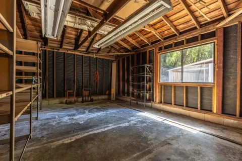 a view of an empty room with a balcony