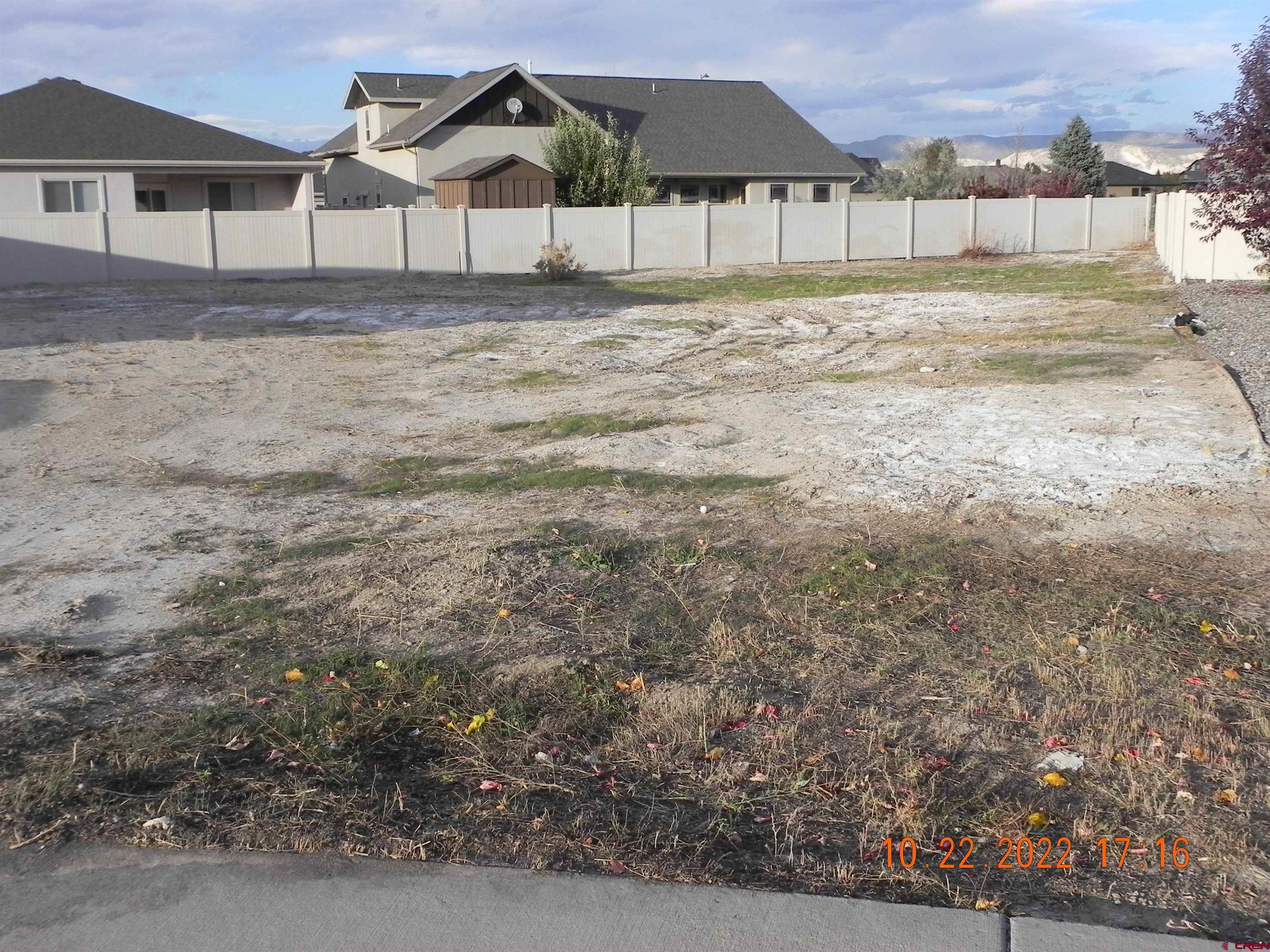 Lot 20 Glacier Court Montrose, CO 81401 - Photo 4 of 4 a house with a yard