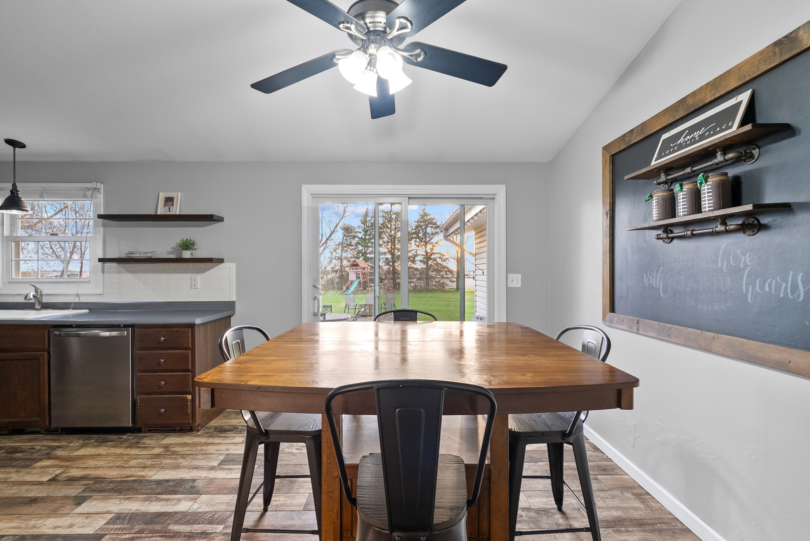 27440 Highway 52 Manhattan, IL 60442 - Photo 34 of 50 a view of a dining room with furniture window and wooden floor