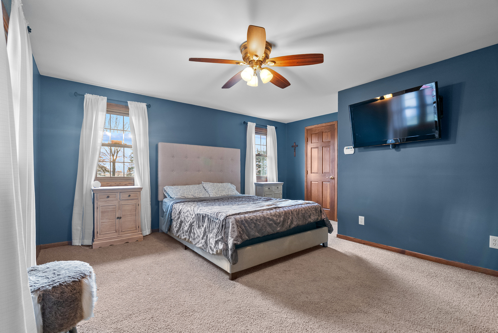 27440 Highway 52 Manhattan, IL 60442 - Photo 44 of 50 a bedroom with a bed and a flat screen tv