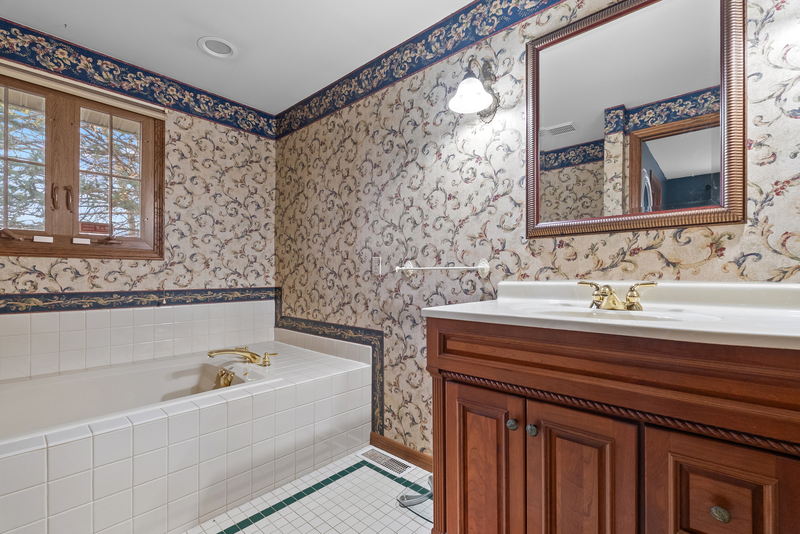 27440 Highway 52 Manhattan, IL 60442 - Photo 47 of 50 a bathroom with a sink and a bathtub