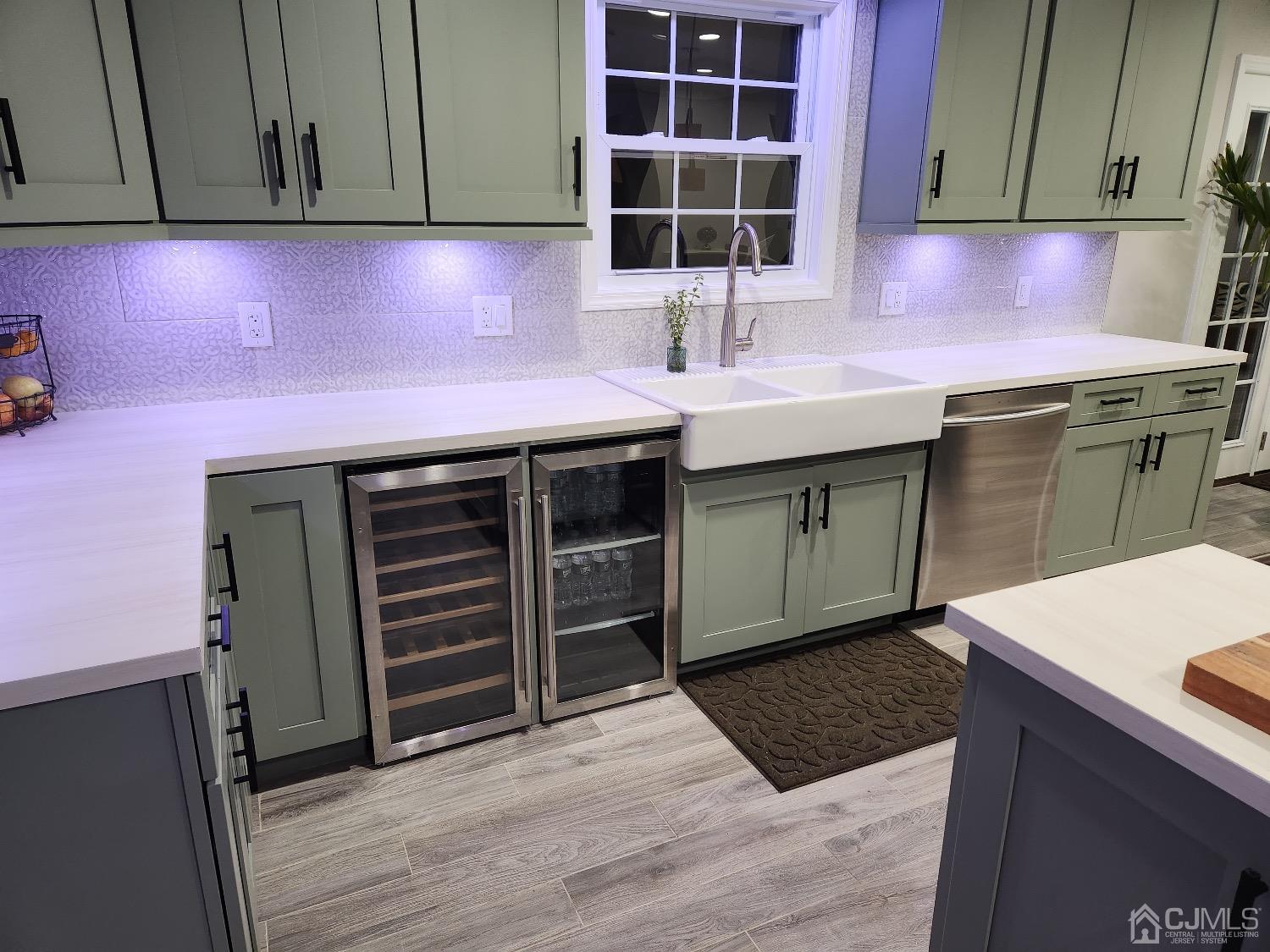 16 Fairfax Road Edison, NJ 08817 - Photo 8 of 40 a kitchen with granite countertop a sink cabinets and stainless steel appliances