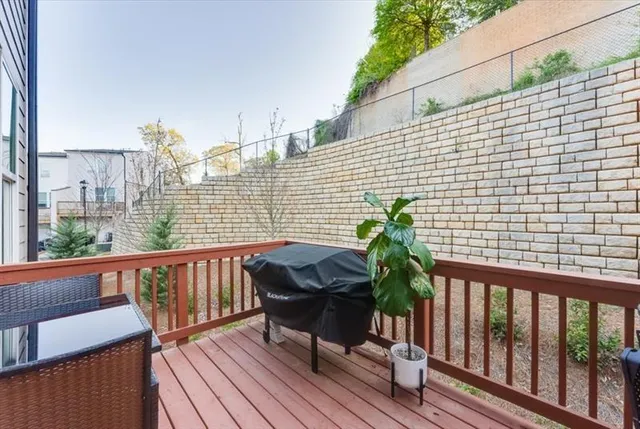 a view of balcony with furniture