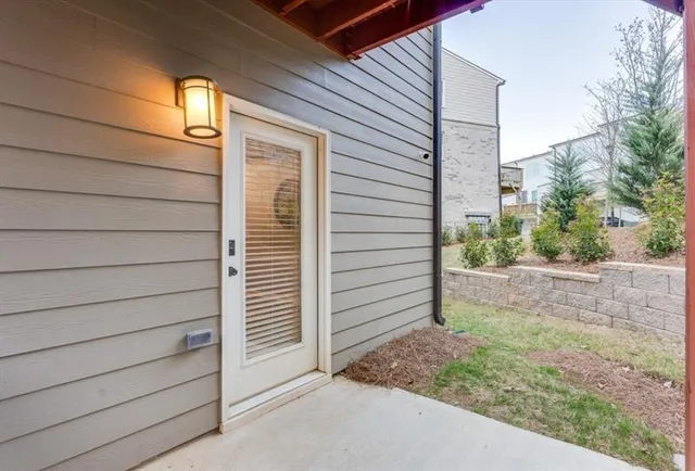 a view of small space in front of a house