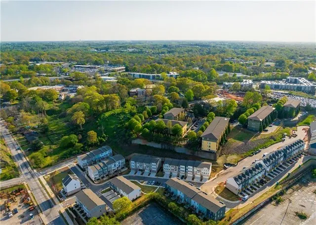 an aerial view of a city with lots of residential buildings