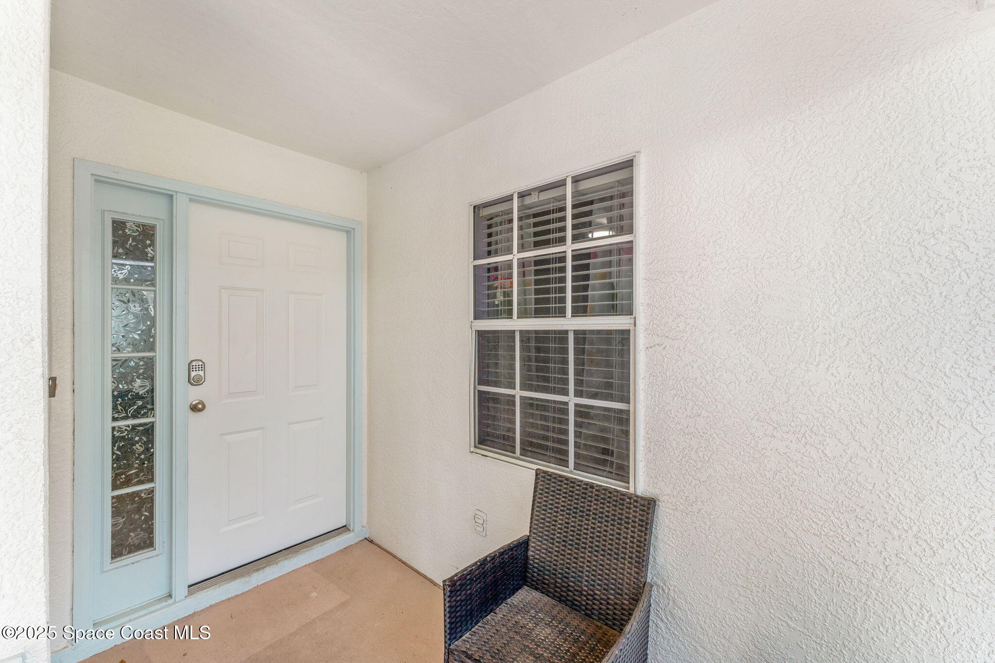 1157 Goldenrod Circle Northeast Palm Bay, FL 32905 - Photo 25 of 31 an empty room with windows